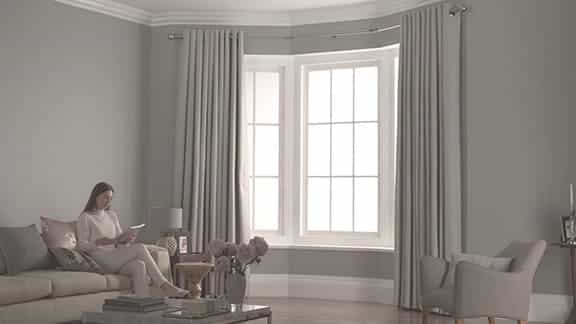 Curved curtain rods for bay windows