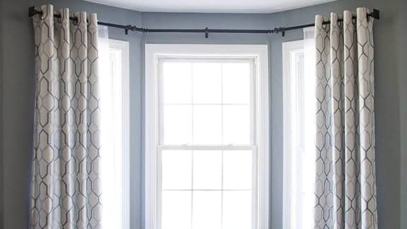 Curved curtain rods for bay windows